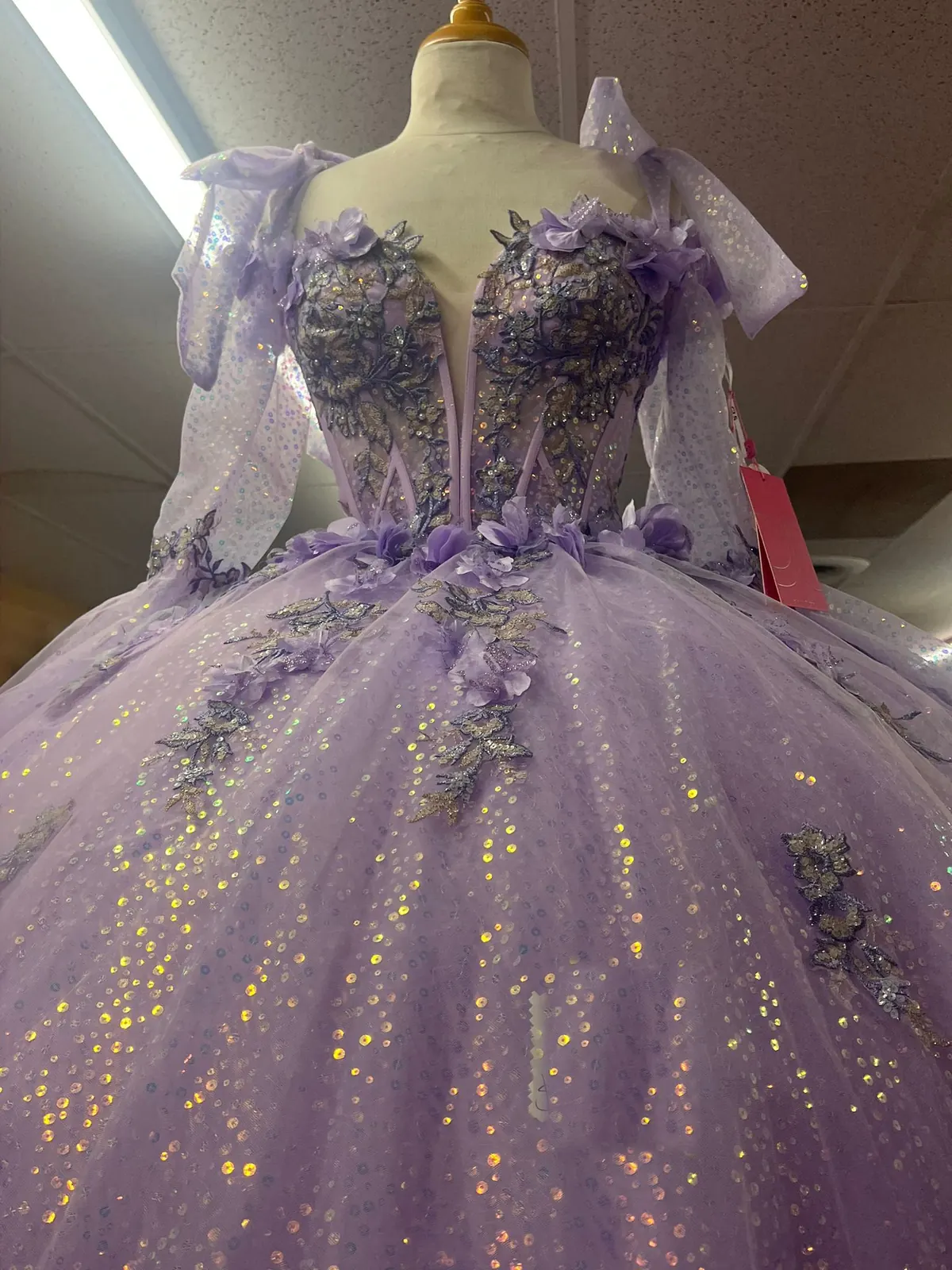 Lilac quinceañera ball gown with iridescent sequins at Yessenia's Fashion in Porterville